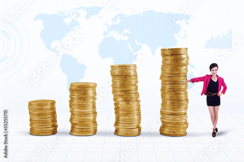 Photo: Businesswoman and coins chart Businesswoman and coins chart