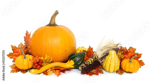 Photo: Autumn arrangement of pumpkins and gourds with red leaves Autumn arrangement of pumpkins and gourds with red leaves