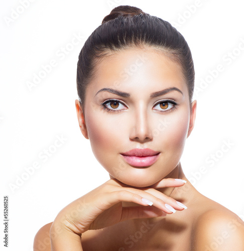 Photo: Face of Young Woman with Clean Fresh Skin isolated on white Face of Young Woman with Clean Fresh Skin isolated on white