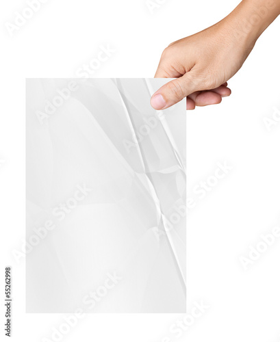 Photo: Hand holding white crumpled paper isolated on white background Hand holding white crumpled paper isolated on white background