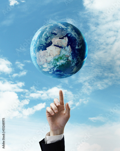 Illustration: hand pushing at earth hand pushing at earth