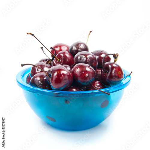Photo: Fresh cherries in bowl isolated on white Fresh cherries in bowl isolated on white