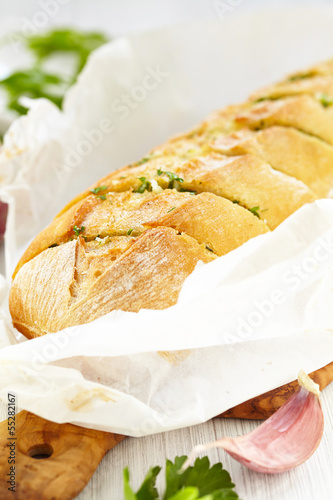 Photo: Baked garlic bread with herbs Baked garlic bread with herbs