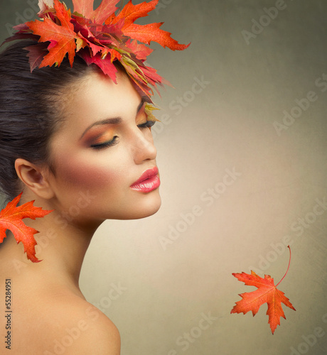 Photo: Autumn Woman Fashion Portrait. Fall Autumn Woman Fashion Portrait. Fall