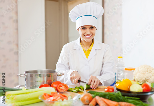 Photo: cook in toque prepares veggie lunch cook in toque prepares veggie lunch