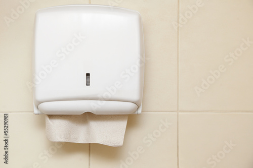 Photo: Paper towel dispenser in the bathroom Paper towel dispenser in the bathroom
