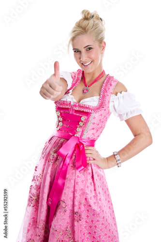 Photo: Blondes Mädchen isoliert im rosa Dirndlkleid aus Bayern Blondes Mädchen isoliert im rosa Dirndlkleid aus Bayern