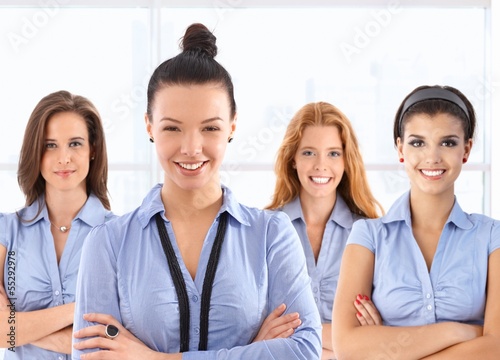 Photo: Female front office workers in uniform Female front office workers in uniform