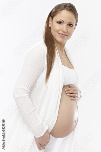 Photo: Portrait of attractive young pregnant woman Portrait of attractive young pregnant woman