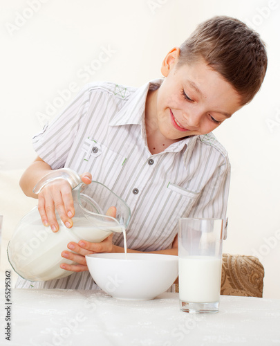 Photo: Boy eat breakfast Boy eat breakfast