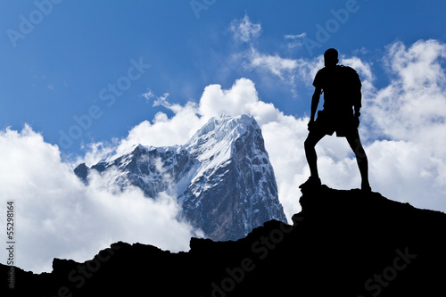 Photo: Hiker silhouette, man and mountains Hiker silhouette, man and mountains