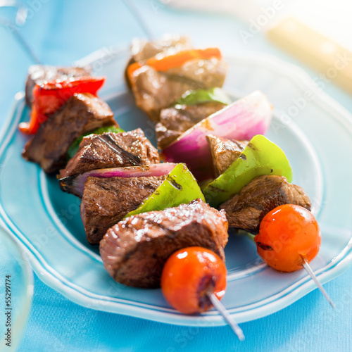 Photo: grilled beef shishkabobs on table grilled beef shishkabobs on table