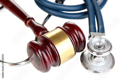 Photo: Medicine law concept. Gavel and stethoscope isolated on white Medicine law concept. Gavel and stethoscope isolated on white