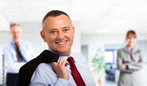 Photo: Smiling businessman portrait Smiling businessman portrait