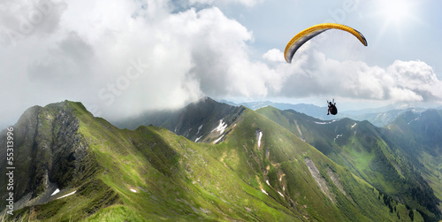 Photo: Paraglider in the Mountains Paraglider in the Mountains