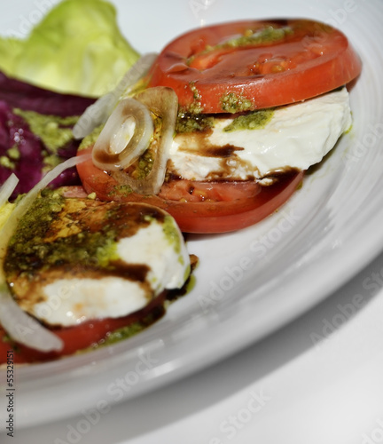 Photo: Salad With Mozzarella And Tomatoes Salad With Mozzarella And Tomatoes