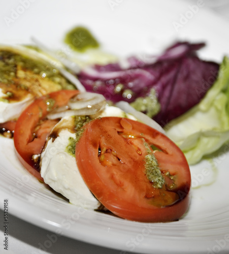 Photo: Salad With Mozzarella And Tomatoes Salad With Mozzarella And Tomatoes