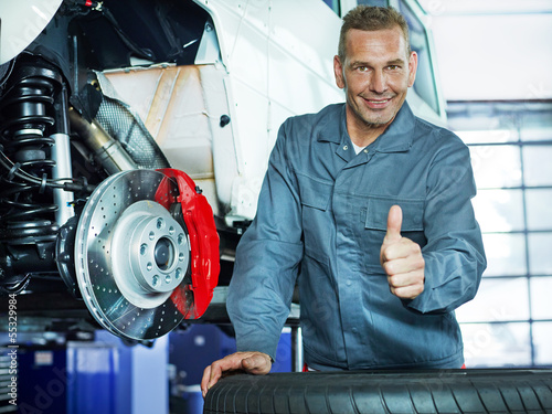 Photo: Master mechanic shows thumb up Master mechanic shows thumb up