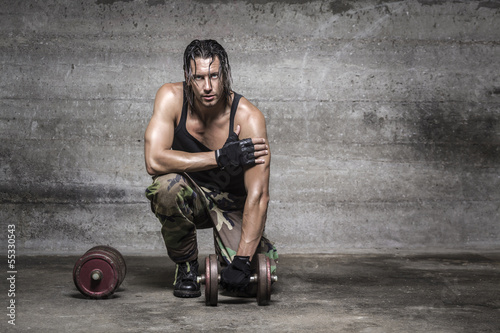 Photo: portrait of handsome athlete looking at camera portrait of handsome athlete looking at camera