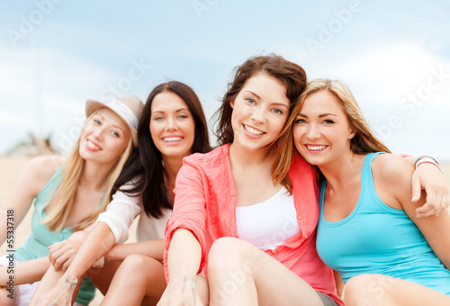 Photo: girls with drinks on the beach girls with drinks on the beach
