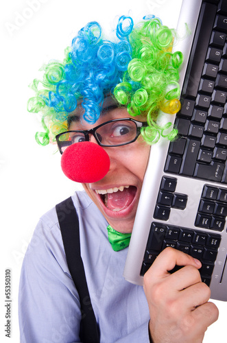 Photo: Funny guy with clown wig on white Funny guy with clown wig on white