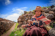 Peruvian Indian Woman in Traditional Dress Weaving Peruvian Indian Woman in Traditional Dress Weaving