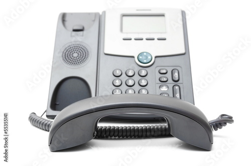 Photo: telephone off the hook on a white background telephone off the hook on a white background
