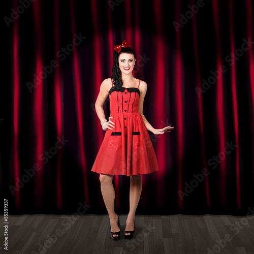 Photo: Dancing woman wearing retro rockabilly dress Dancing woman wearing retro rockabilly dress