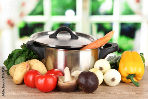 Photo: Ingredients for cooking soup on table in kitchen Ingredients for cooking soup on table in kitchen