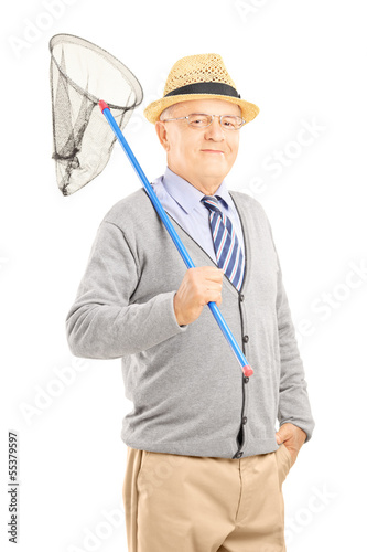 Photo: Smiling mature gentleman posing with a butterfly net Smiling mature gentleman posing with a butterfly net