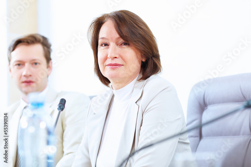 Photo: Two businesspeople at meeting Two businesspeople at meeting