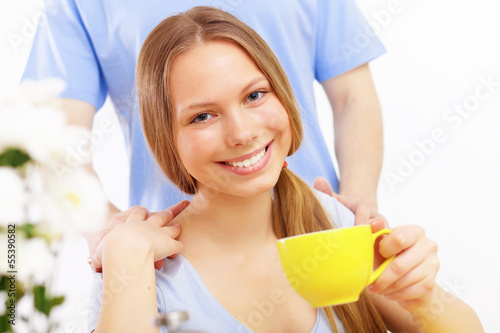 Photo: Beautiful young woman drinking tea Beautiful young woman drinking tea