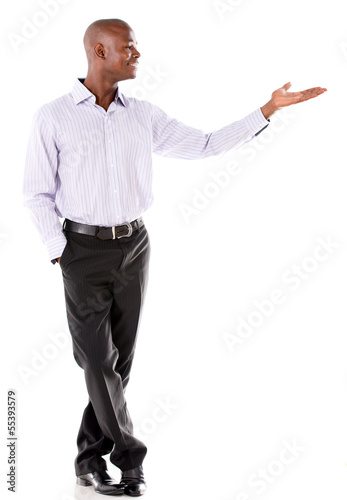 Photo: Business man presenting something Business man presenting something