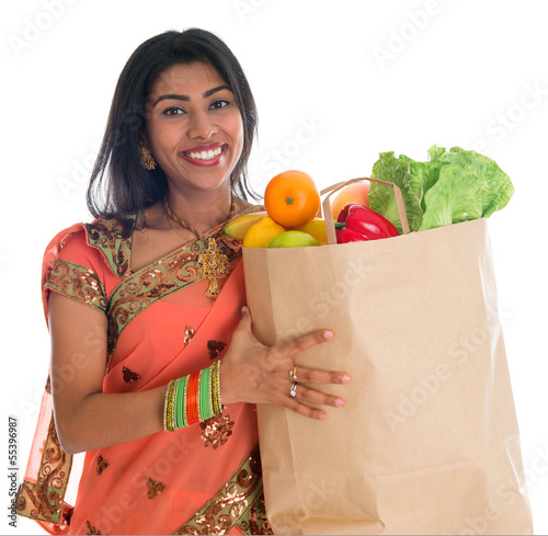 Photo: Indian woman having groceries shopping Indian woman having groceries shopping