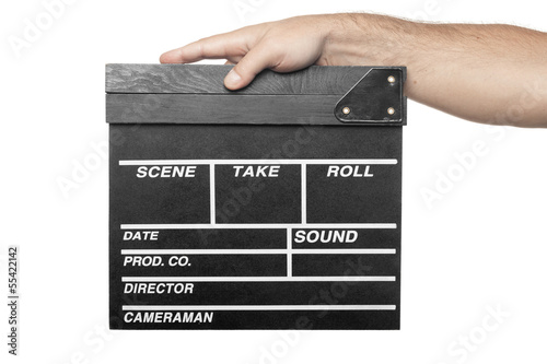 Photo: male hand holding movie production clapper board isolated on whi male hand holding movie production clapper board isolated on whi