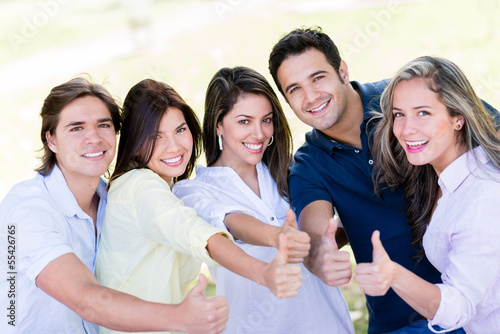 Photo: Happy friends with thumbs up Happy friends with thumbs up