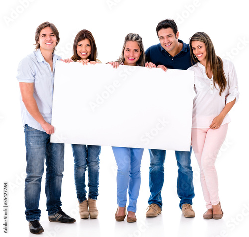 Photo: Group of people holding a banner Group of people holding a banner