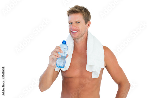 Photo: Thirsty man holding a bottle of water Thirsty man holding a bottle of water