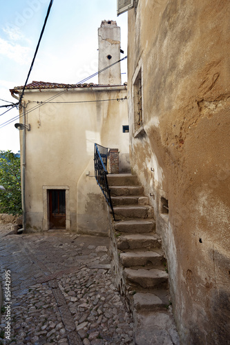Photo: Beautiful mediterranean old stairs in Vrbnik Town Croatia Beautiful mediterranean old stairs in Vrbnik Town Croatia