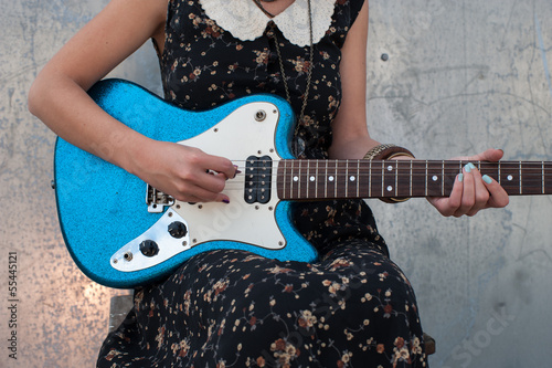 Photo: playing electric guitar playing electric guitar