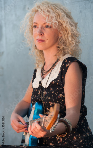 Photo: electric guitar girl portrait electric guitar girl portrait