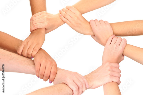 Photo: Ring of hands, isolated on white. Conceptual photo of teamwork Ring of hands, isolated on white. Conceptual photo of teamwork