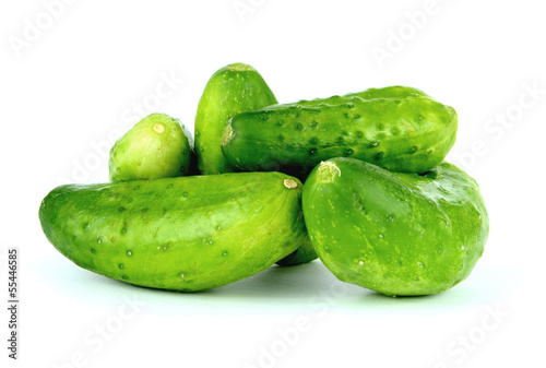 Photo: Cucumbers isolated on white. Cucumbers isolated on white.
