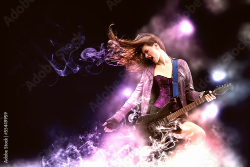 Photo: Rock passionate girl with black wings Rock passionate girl with black wings