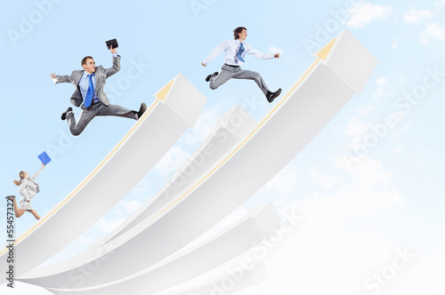 Photo: Businesspeople jumping Businesspeople jumping