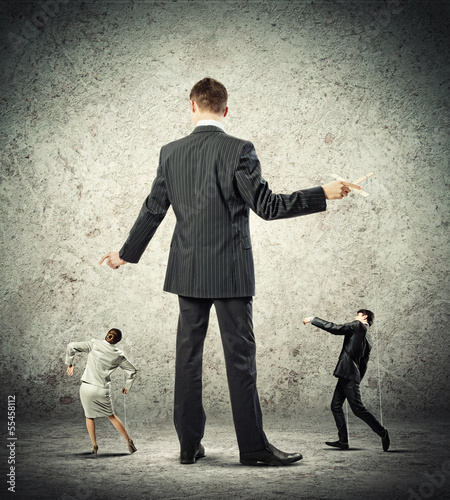 Photo: Businessman puppeteer Businessman puppeteer