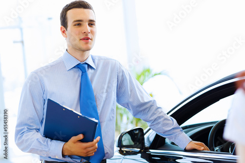 Photo: Young man consultant Young man consultant