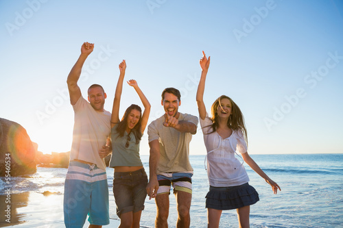 Photo: Cheerful group of friends dancing together Cheerful group of friends dancing together