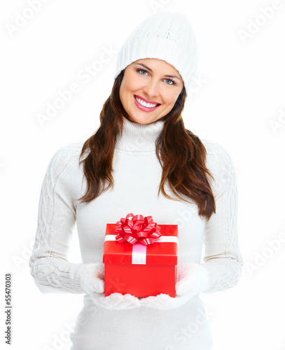 Photo: Beautiful young Christmas girl with gift. Beautiful young Christmas girl with gift.