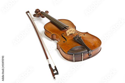 Photo: Old violin on a white background Old violin on a white background